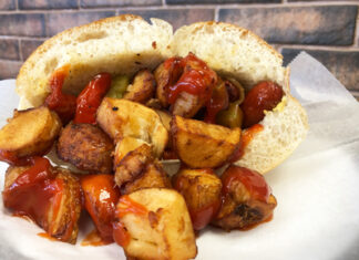 Italian Hot Dog in Newark, North Jersey – Iconic NJ foods Overflowing Italian hot dog from Dickie Dee's in Newark, NJ