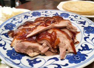 Peking duck – Beijing, China A plate of Peking duck with pancakes from an iconic Beijing restaurant.
