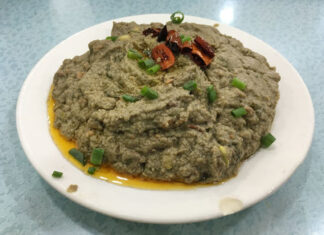 Madoufu – Beijing, China | Eat Your World A plate of green madoufu dip in Beijing, kind of a Chinese hummus made of mung bean.