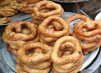 Sel roti – Kathmandu, Nepal Stacks of fried rice doughnuts, called sel roti, from Kathmandu, Nepal.