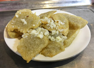 Guanchang – Beijing, China – Local Food Guide Beijing-style guanchang, pieces of fried batter over fried intestine with tofu.