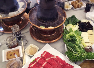 Hot Pot, Shuan Rou – Beijing, China Beijing-style hot pot, or shuan rou, using a miniature coal-burning stove with chimney.