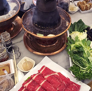 Hot Pot, Shuan Rou – Beijing, China Beijing-style hot pot, or shuan rou, using a miniature coal-burning stove with chimney.