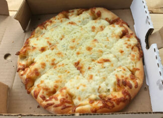 Garlic fingers in Nova Scotia Cheesy garlic fingers in a pizza box from a Nova Scotia pizzeria.