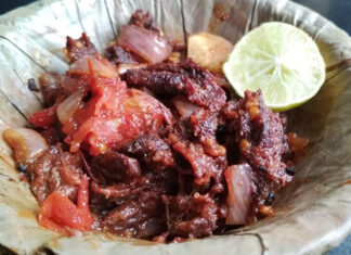 Sukuti – Kathmandu, Nepal | Eat Your World Sukuti, air-dried buffalo meat cooked in sauce and served in a bowl made of leaves, from Kathmandu