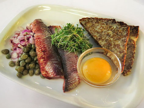 Marinated herring with egg yolk from Copenhagen, Denmark