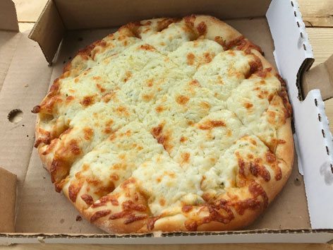 Cheesy garlic fingers in a pizza box from a Nova Scotia pizzeria.