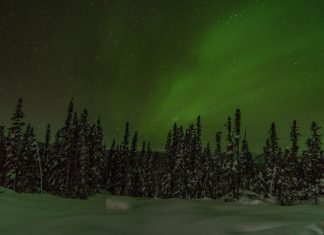 How to Photograph the Northern Lights and Keep Warm Doing It