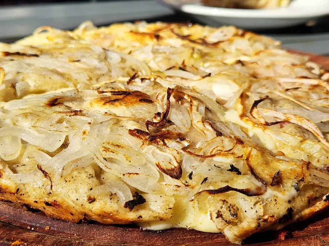 A cheesy, oniony fugazzeta rellena at Guerrin in Buenos Aires.