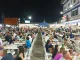 The Hua Hin Night Market Preferred by Locals Tables filled with diners and drinkers at the outdoor Baan Khun Por food court night market in Hua Hin, Thailand